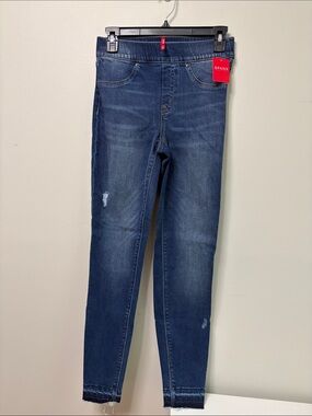 SPANX Distressed Ankle Skinny Jeans in a medium wash. These high-rise leggings S